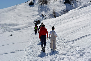 Going up the mountain on the snow