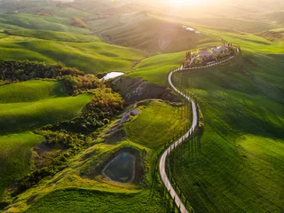 Foto op Canvas Aerial drone landscape of famous Tuscany hills, Italy spring fields sunset Asciano Siena Firenze © PawelUchorczak