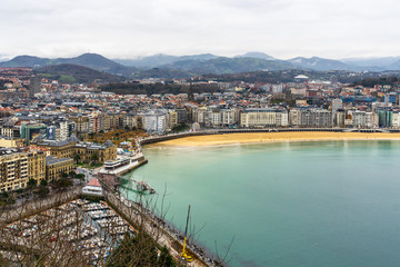 Fototapeta premium Panoramic view of San Sebastian and La Concha beach in winter viewed from Monte Urgull, Basque Country, Spain.