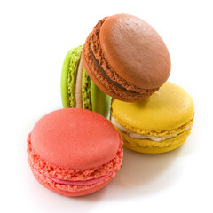 sweet and colorful dessert macarons isjlated on white background