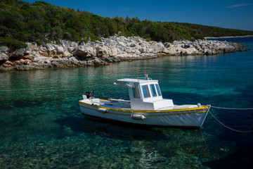 Fototapeta na wymiar Boats in a quiet bay of Milna on Brac island, Croatia