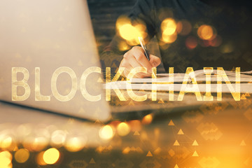 Fototapeta premium Man's hands working with notes background. Cryptocurrency and finance concept.