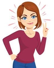 Funny woman showing tongue making victory sign  hand gesture