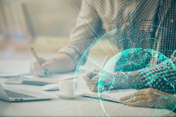 Social network theme hologram with businessman working on computer on background. Concept of world wide web. Double exposure.