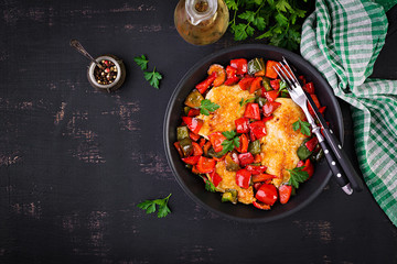 Grilled chicken fillets and sweet pepper on grill iron pan. Top view, copy space
