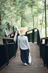 woman walking at the stairs in the outdoor