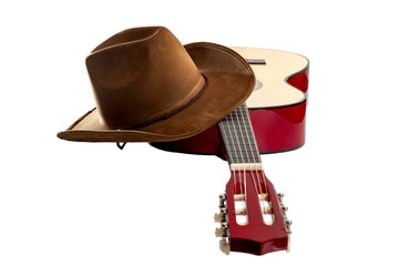 American culture, folk song and country muisc concept theme with a cowboy hat and an acoustic...