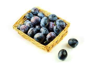 Plums in basket