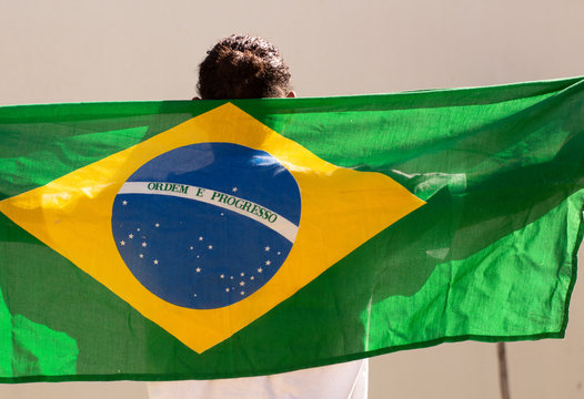 Brazilian Young Black Man Student with Brazil Flag.