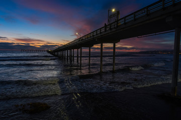 Fototapeta na wymiar Sunset at Ocean Beach Pier in San Diego California, USA