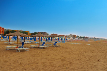 a beach on a sunny summer day