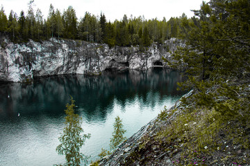 Mountain turquoise lake in a marble canyon.