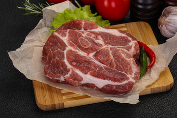 Raw pork neck steak