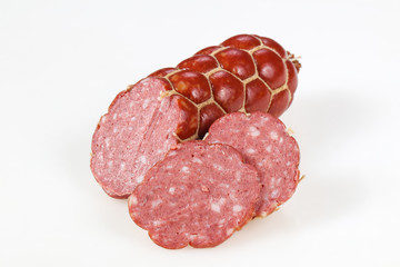 Tasty meat sausages over white background