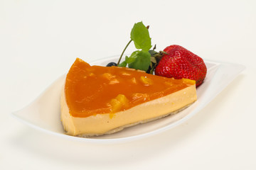 Cheesecake with apricot served strawberry