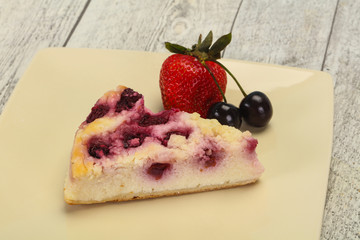 Cheesecake with cherry served strawberry