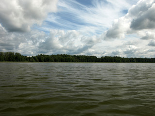 view of the lake with beautiful clouds.  sunny summer day, Lielezers, Latvia