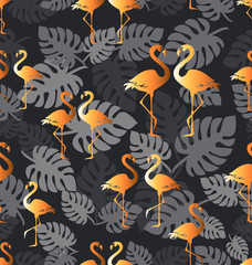 Golden flamingo. Seamless pattern with tropical birds. Flamingo standing on tropical leaves and black background.