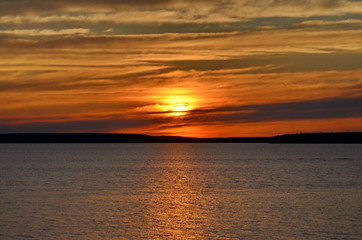 Sunset over water in Saskatchewan, Canada