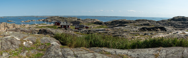 Ursholmen, Sweden - July 26, 2019: View of the red houses on Ursholmen Island in the Swedish Kosterhavet National Park in western Sweden.
