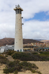 Fototapeta na wymiar Leuchtturm Jandia Playa Esquinzo Morro Jable Beach Faro
