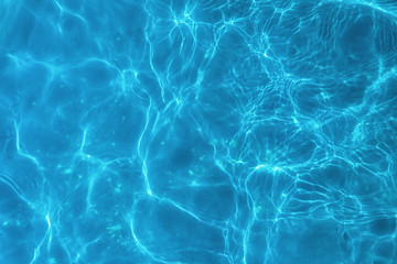 Top view water caustics background.