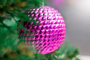 Pink ball on the Christmas tree. Christmas Holiday_
