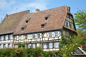 Beautiful traditional European style timber framing houses in city center of Wissembourg in France on a sunny day