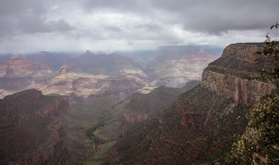 Grand Canyon, Arizona, USA. Overlook of the red rocks, cloudy sky background