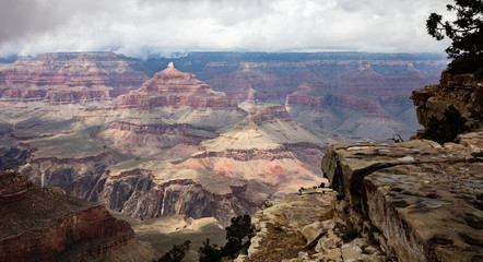 Fototapeta na wymiar Grand Canyon, Arizona, USA. Overlook of the red rocks, cloudy sky background
