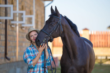  Woman and horse. Close up