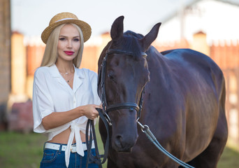Woman and horse. Close up