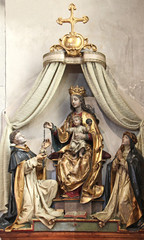 Madonna con Bambino e due Santi; scultura in legno dipinto nella chiesa parrocchiale di San Zeno a Naturno