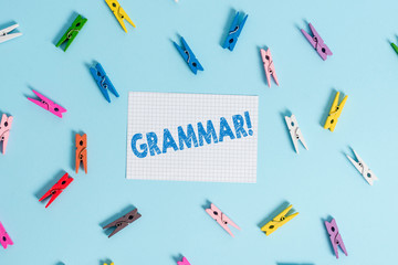 Handwriting text writing Grammar. Conceptual photo whole system structure language syntax and morphology Colored clothespin rectangle shaped reminder paper light blue background