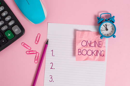 Conceptual hand writing showing Online Booking. Concept meaning Reservation through internet Hotel accommodation Plane ticket Calculator clock mouse crushed note pencil color background
