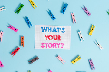 Handwriting text writing What S Your Story Question. Conceptual photo asking demonstrating about his past life actions events Colored clothespin rectangle shaped reminder paper light blue background