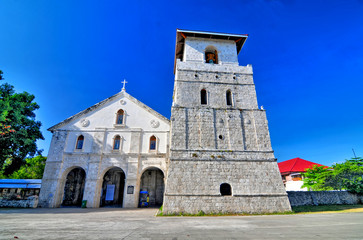 Fototapeta na wymiar Katolicki kościół kolonialny w miejscowości Baclayon na Filipińskiej wyspie Bohol.