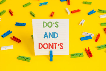 Conceptual hand writing showing Do S Is And Dont S Is. Concept meaning advising Rules or customs concerning some activity