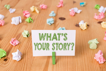 Conceptual hand writing showing What S Your Story Question. Concept meaning asking demonstrating about his past life actions events Colored crumpled papers wooden floor background clothespin