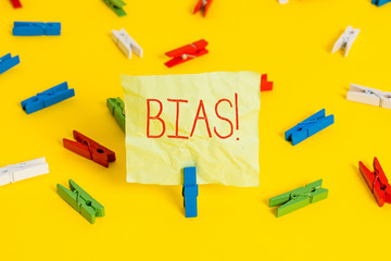 Conceptual hand writing showing Bias. Concept meaning inclination or prejudice for or against one...
