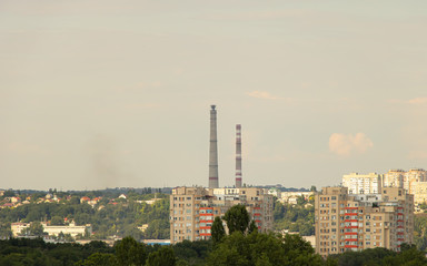 Heat and power factory chimney in the city