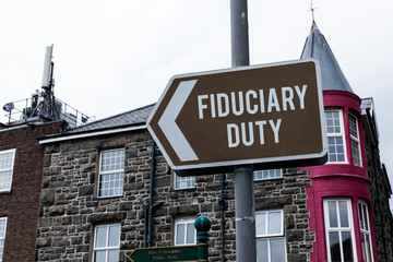 Text sign showing Fiduciary Duty. Business photo showcasing A legal obligation to act in the best...