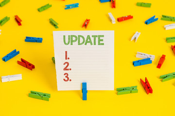 Conceptual hand writing showing UPDATE. Concept meaning make something more modern or up to date like software program