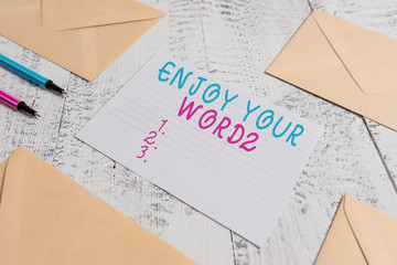 Word writing text Enjoy Your Weekend. Business photo showcasing wishing someone that something nice will happen at holiday Envelopes highlighters ruled paper sheet wooden retro vintage background