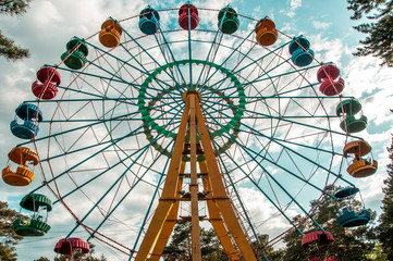 Fototapeta premium Ferris wheel on blue sky background
