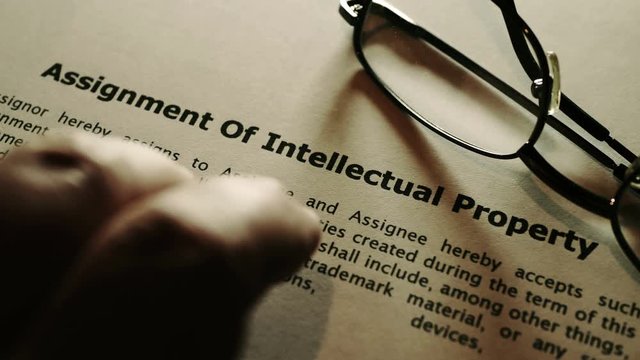 Finger tapping on assignment on intellectual property form