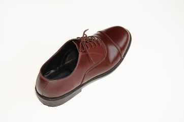 Brown leather shoes photos Put on a white background