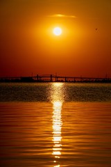 A sunrise over Hamilton Harbor above Burlington Skyway bridge