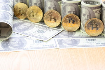 Golden Bitcoin on US dollars banknote background, Exchange Digital currency concept.