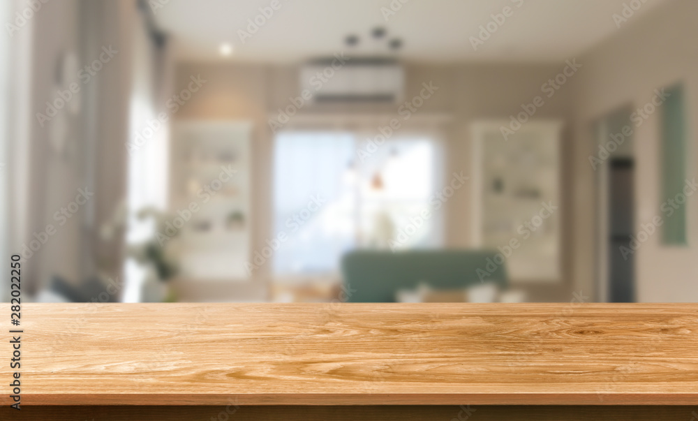 Wall mural wood table in modern home room interior with empty copy space on the table for product display mocku